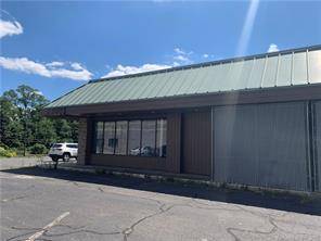 4600 square foot commercial building with a large parking lot.