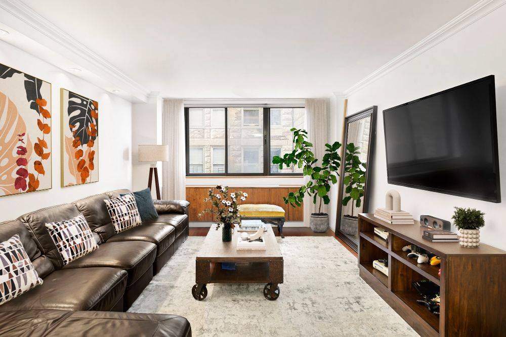 Nestled between Madison Square Park, Union Square, and Gramercy Park in the Flatiron District, this quiet 1 bedroom, 1 bathroom home is a lovely portrait of classic city living.