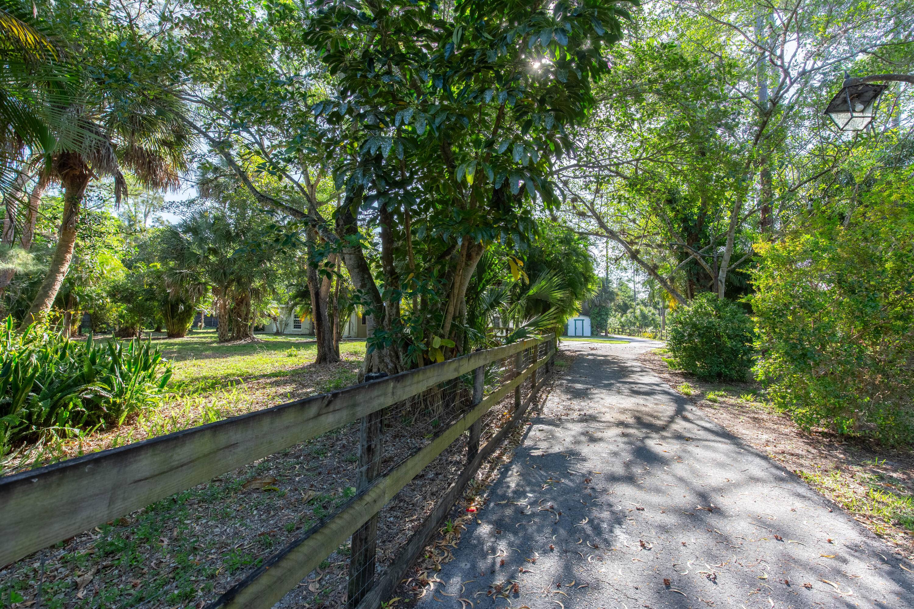 Handyman special situated on fantastic lot in sought after Palm Beach Little Ranches.