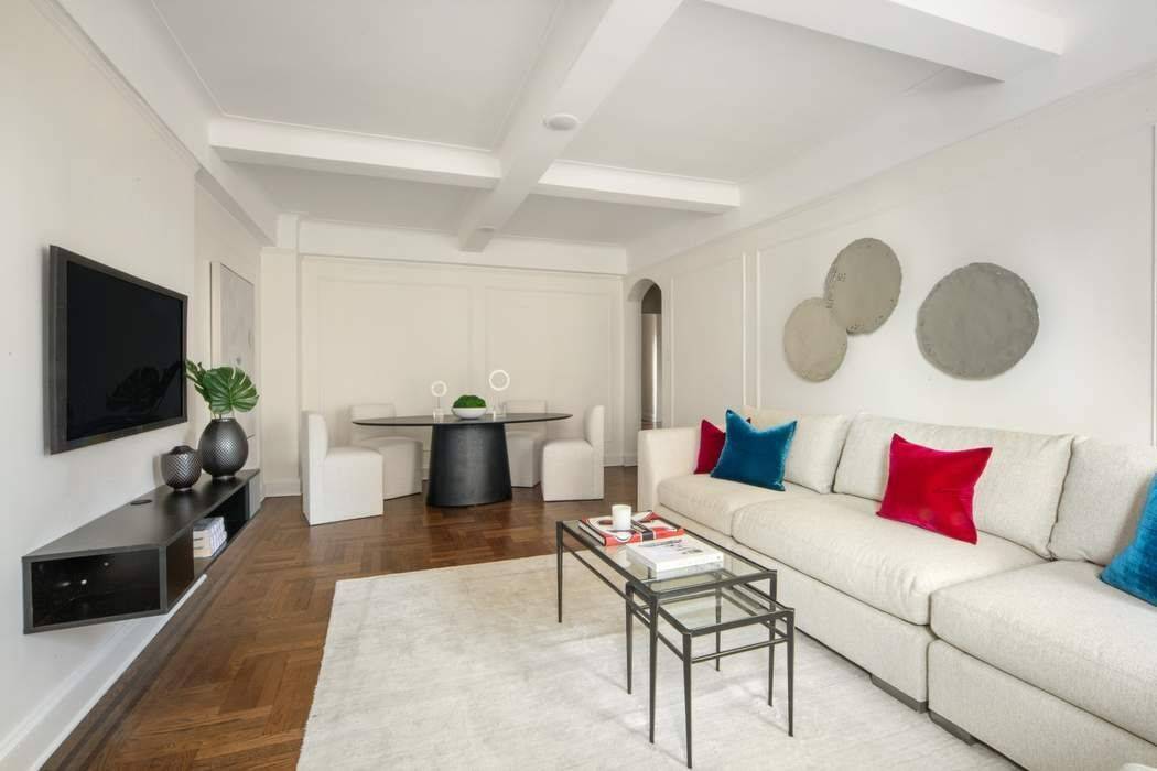 Prewar Renovated 2Bed 2Bath Condo On Park Avenue Enter through the elegant arched foyer into the light filled living room with prewar details and grand proportions.