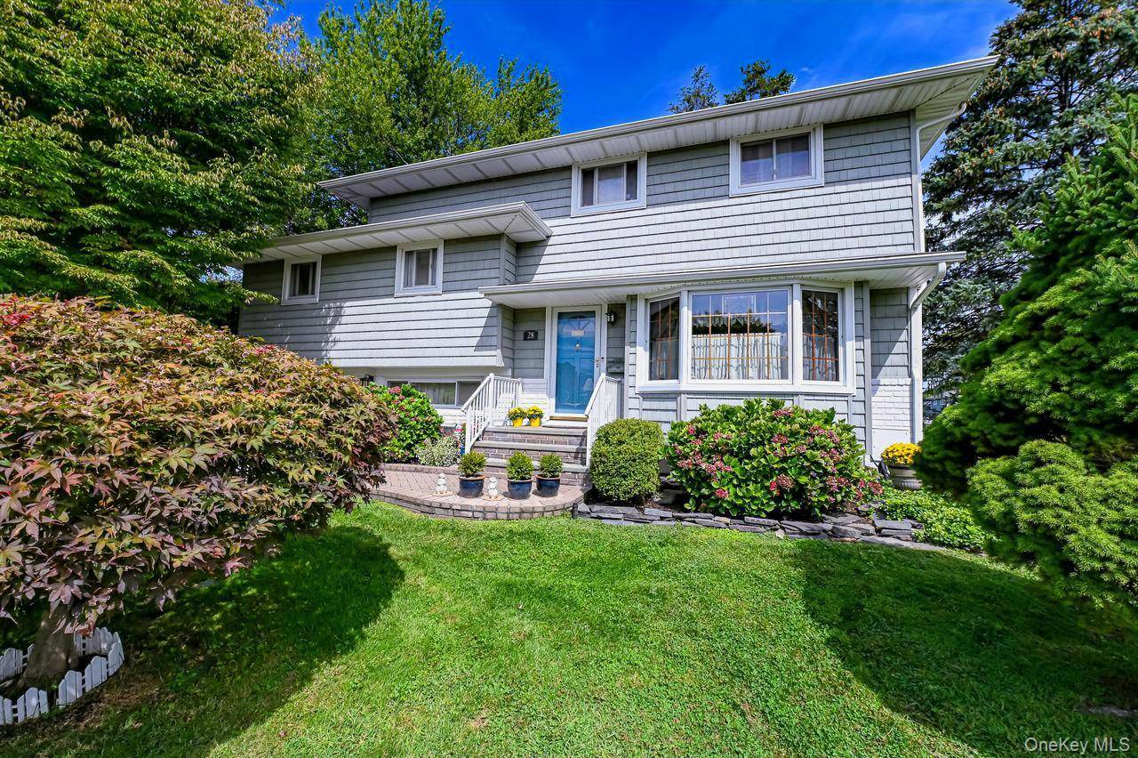 Prime Location ! Nestled in the highly sought after Bethpage School District, this meticulously maintained expanded split level home offers a perfect blend of comfort, space, and convenience.