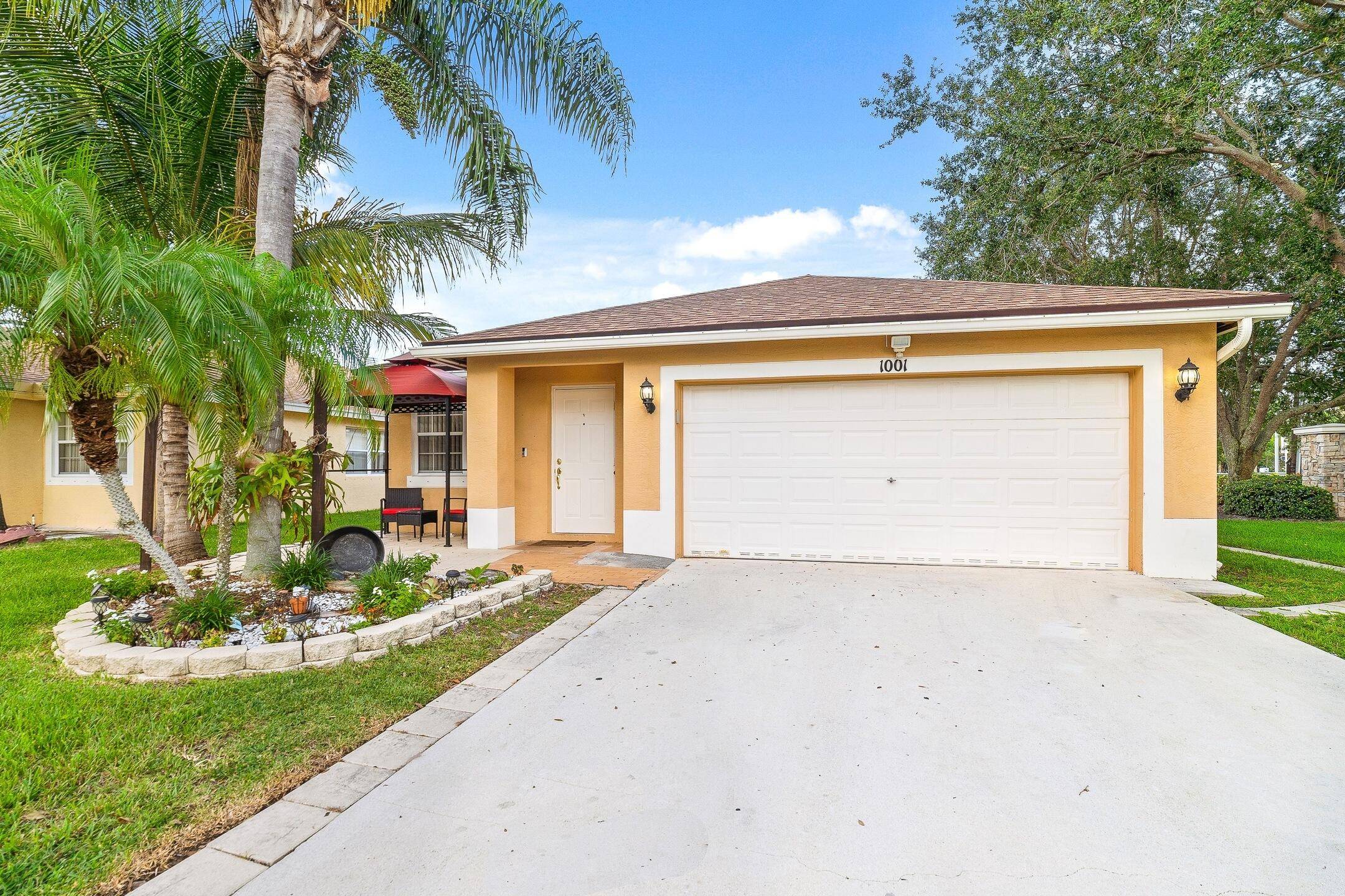 This phenomenal 3 bedroom, 2 bathroom, one story home with a 2 car garage rests on a private, fenced in, 0.