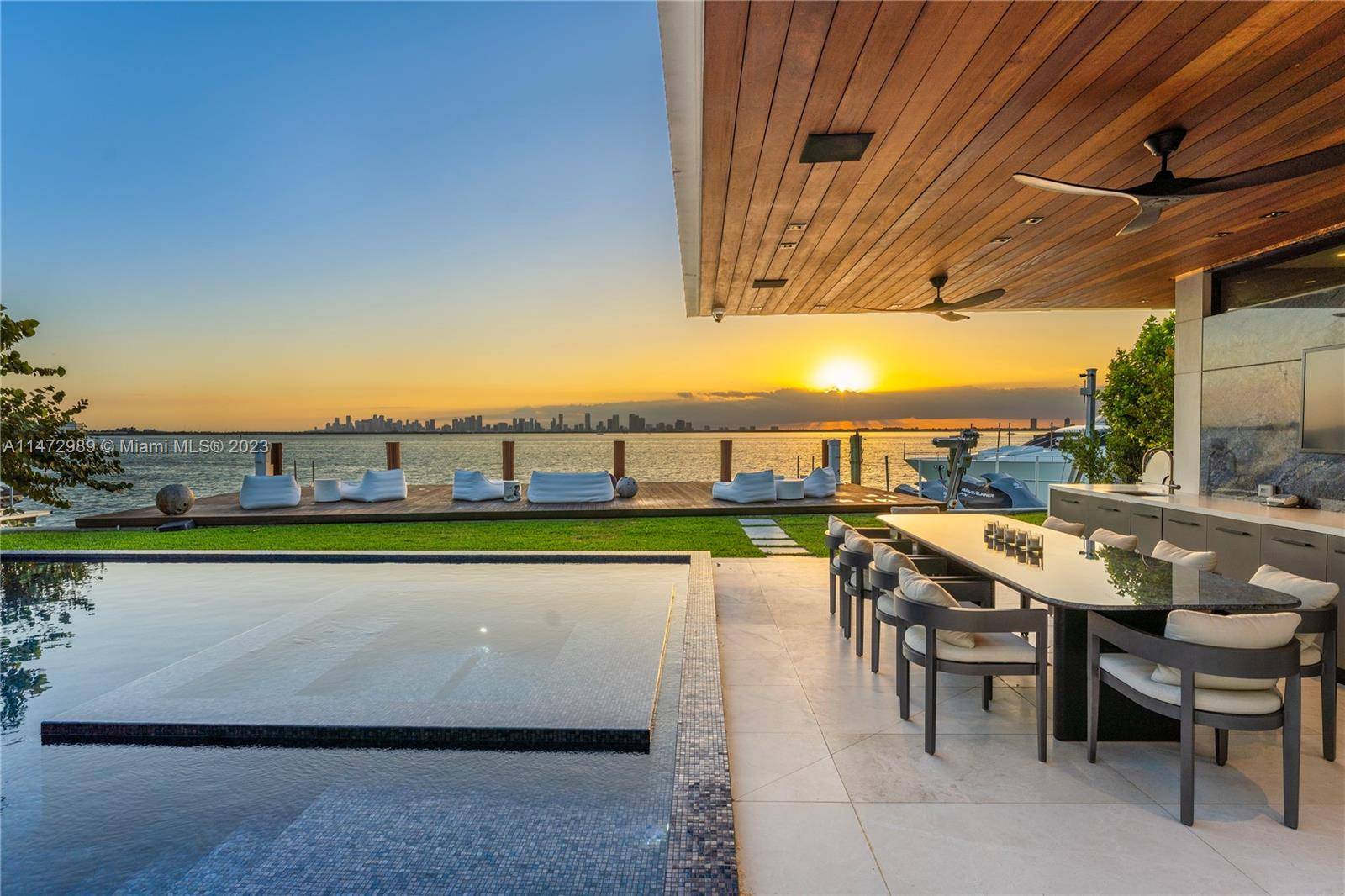 Extravagant modern mansion on prestigious North Bay Road where explosive sunsets over Miami s splendid skyline are a backdrop from everywhere !