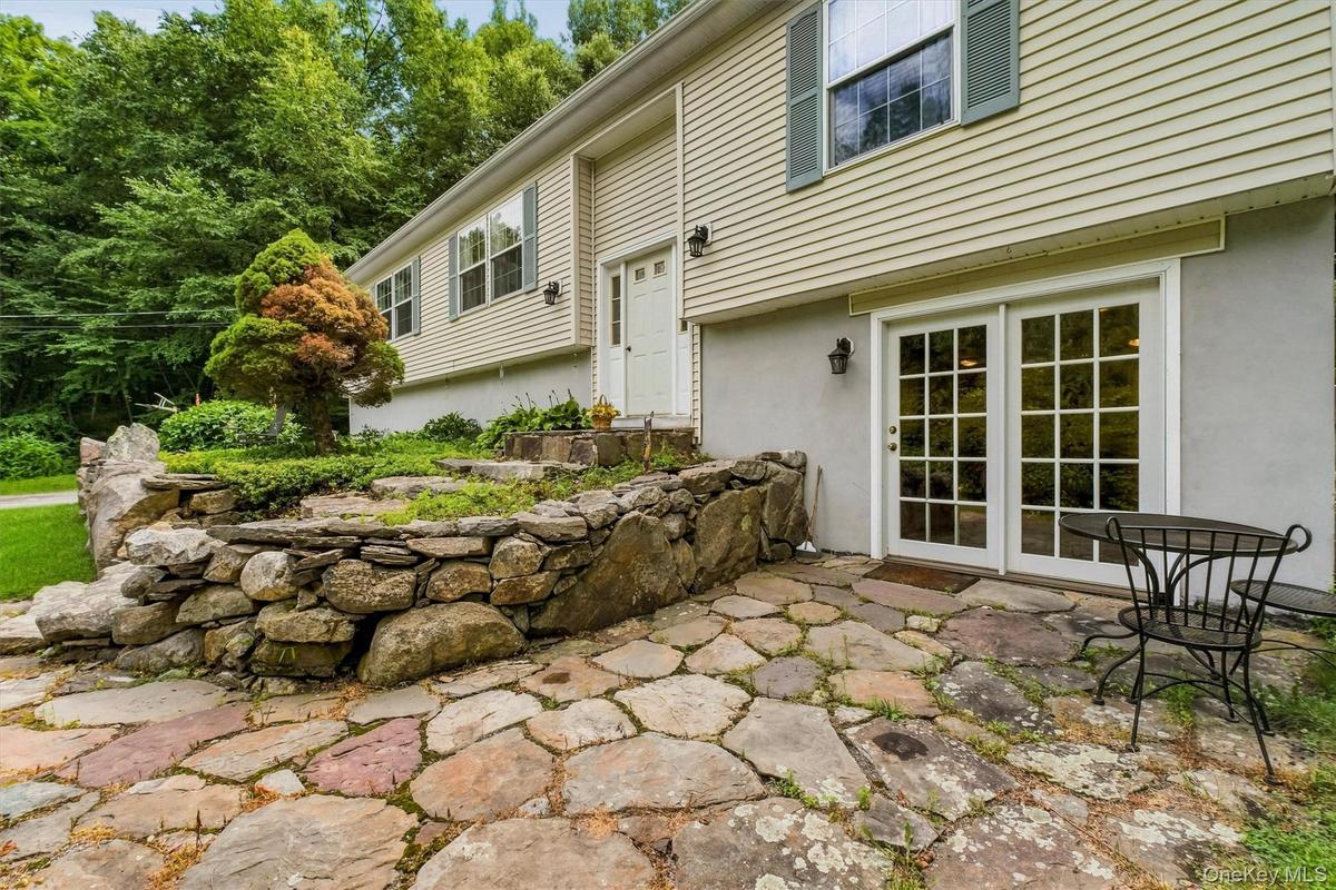 Relax sitting outside enjoying nature or step into the lower level bonus/recreation room...