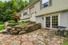 Relax sitting outside enjoying nature or step into the lower level bonus/recreation room...