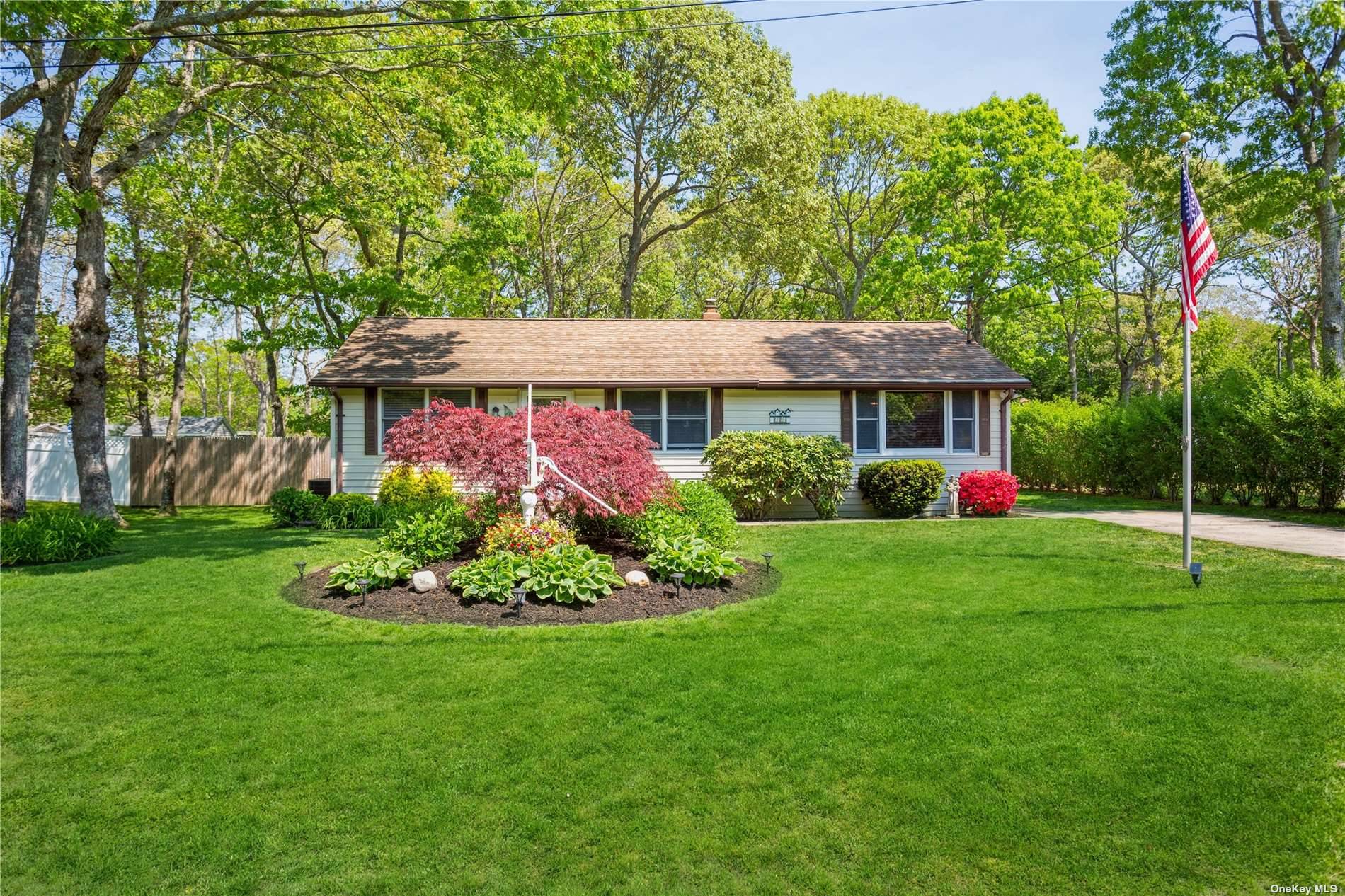 Hampton bays three bedroom primary bedroom with ensuite bathroom, two full bath house in move in condition with large living room and dining room, eat in kitchen.