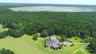 Aerial showing house and lake