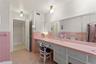 Reverse view of guest bathroom.