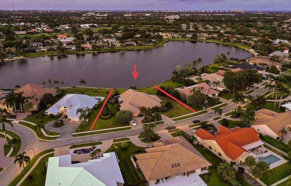 The property features unique waterfront double lot open lake views, greater than half an acre 0.