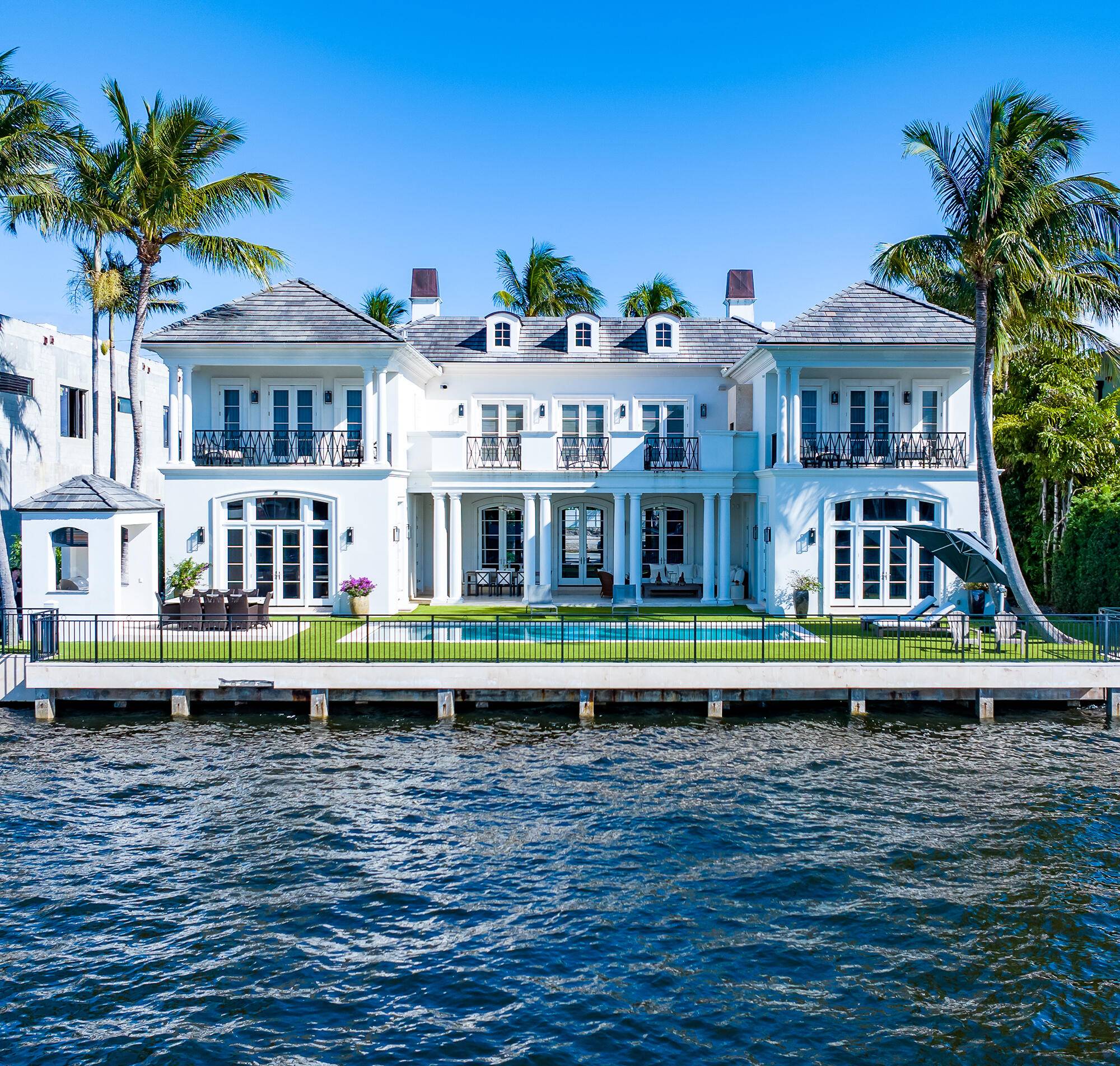 The art of modern living is expressed with eloquent aplomb in this showplace on the Intracoastal Waterway in The Estates, historic Old Boca Raton's prestigious beachside enclave.