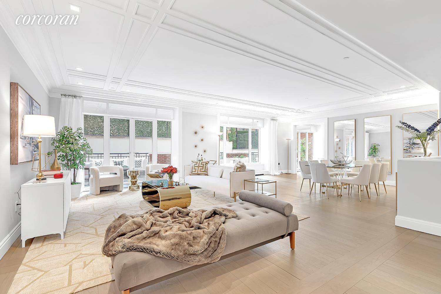 This sun filled, luxury 7 room duplex condominium on the Upper East Side's 'Gold Coast' is a stunning 4 bedroom, 3.