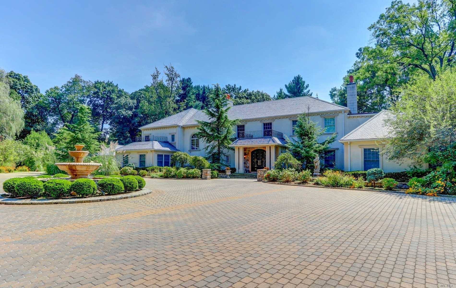 Set Behind Gated Entry on 4 acres w IG Gunite Pool, this Magnificent 9yr Gold Coast Estate Offers Unparalleled Luxury, Spacious Formal Rooms w Fireplaces, Fabulous Chef's Kitchen which opens ...