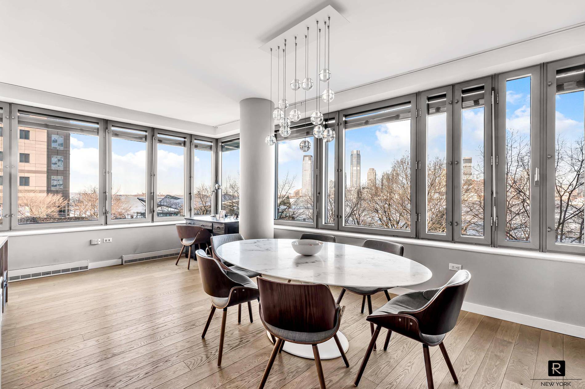 Spacious three bed four bath apartment in the Riverhouse, the only LEED certified Green condominium in North Battery Park West Tribeca.