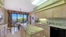 KITCHEN SLIDERS LEAD TO THE EAST FACING BALCONY