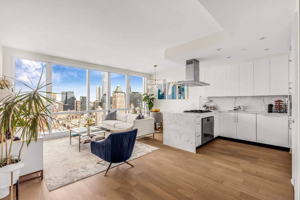Elevated on a pristine high floor within the prestigious Manhattan View condominium, this impeccably crafted 1 bedroom, 1.