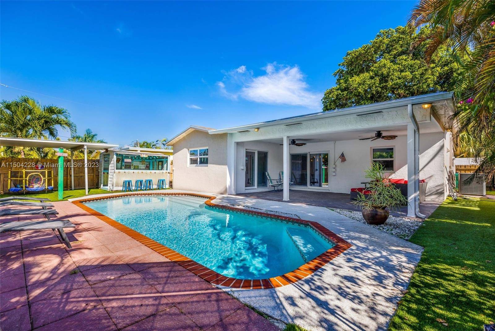 Step inside this beautiful 4 bedroom, 2 bathroon modern sanctuary in the highly desirable Dania Beach area.