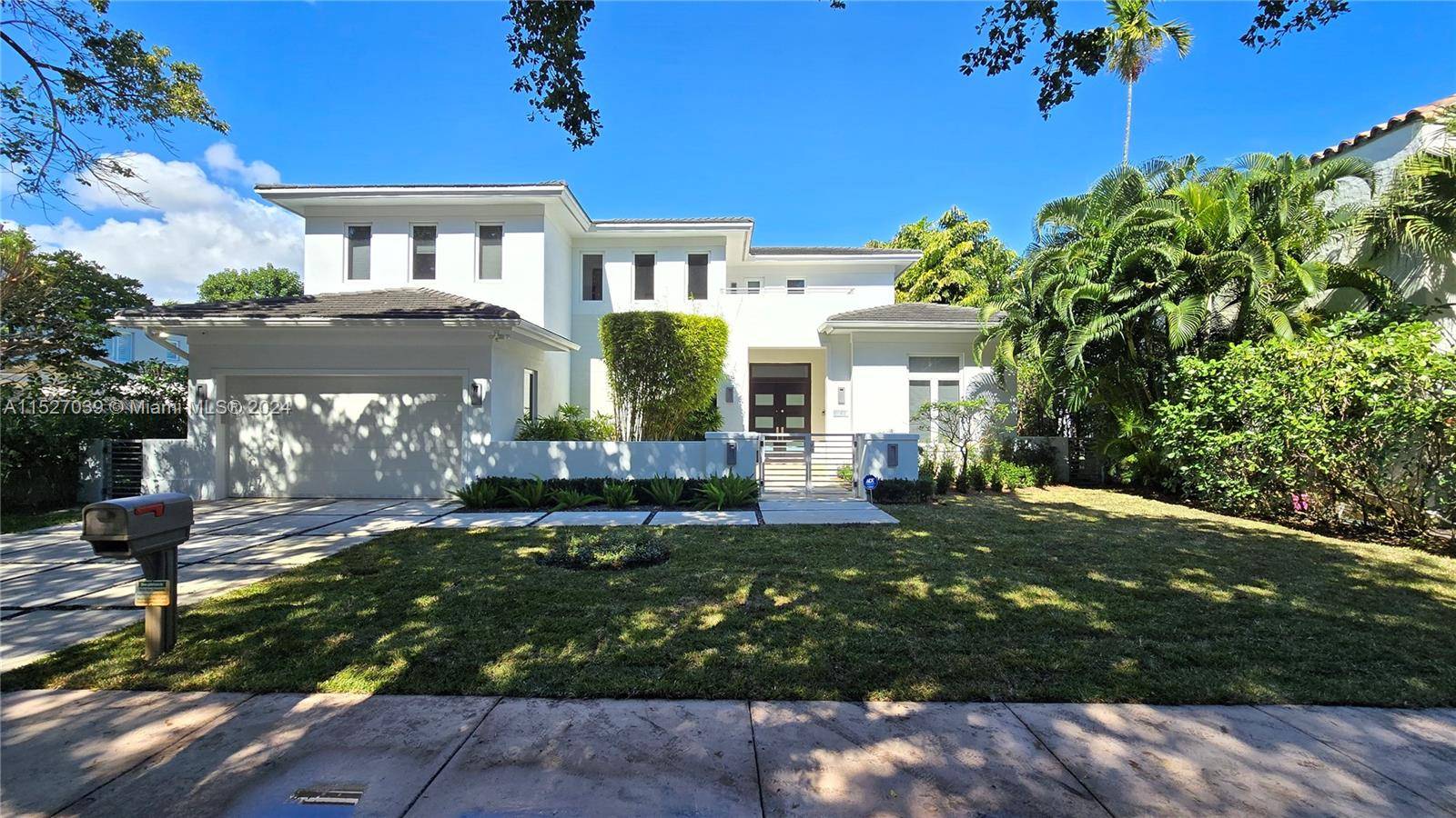 Stunning Coral Gables 2 story dream home built in 2015 boasts five impressive bedrooms, each with its own BA 5 5.