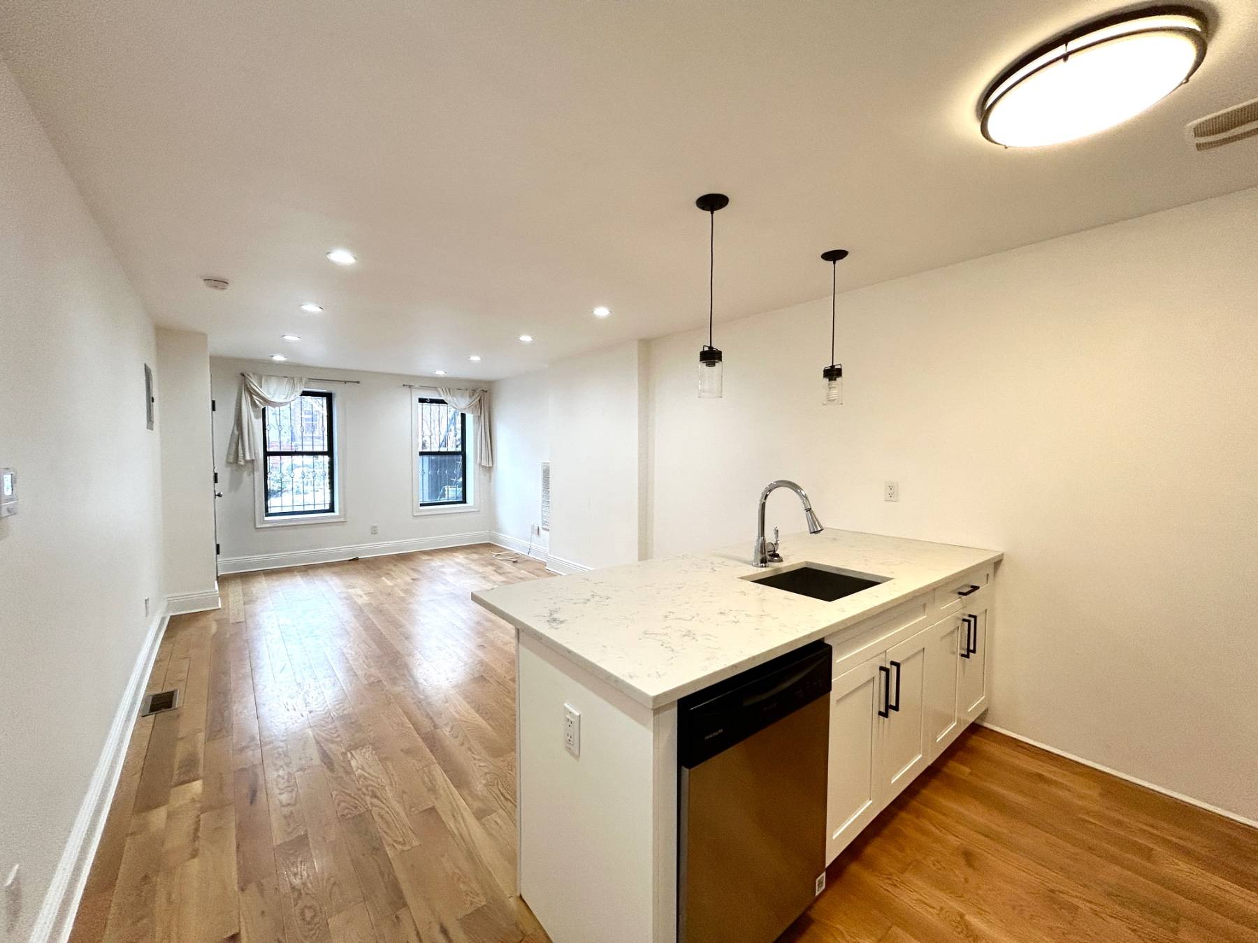 Step into your new haven at 241 Lexington Avenue, where meticulous design meets a revitalized townhouse nestled along a picturesque, tree lined street in Bedford Stuyvesant.