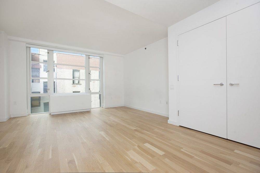 South Facing Studio with Condo Finishes, Washer Dryer in Unit.