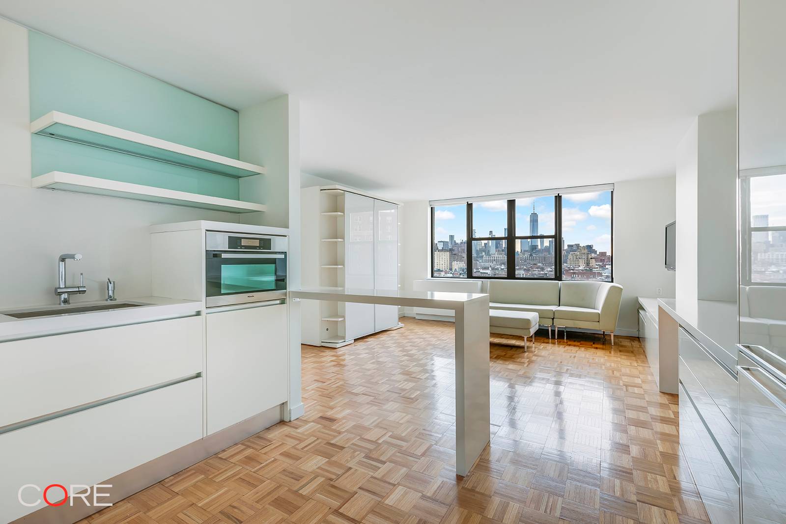 Enjoy panoramic views from this immaculately renovated studio home, perched on a high floor of a full service luxury West Village condominium.