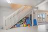 FROM THE GARAGE, the stairwell up into the extra living space (2b/1ba/living room/960sf - one bedroom has gulf views, the other bay views)