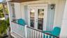 Balcony off of primary bedroom on main level