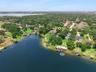 Lake Olivia is an 88 acre private lake. Chain of Lakes in the background