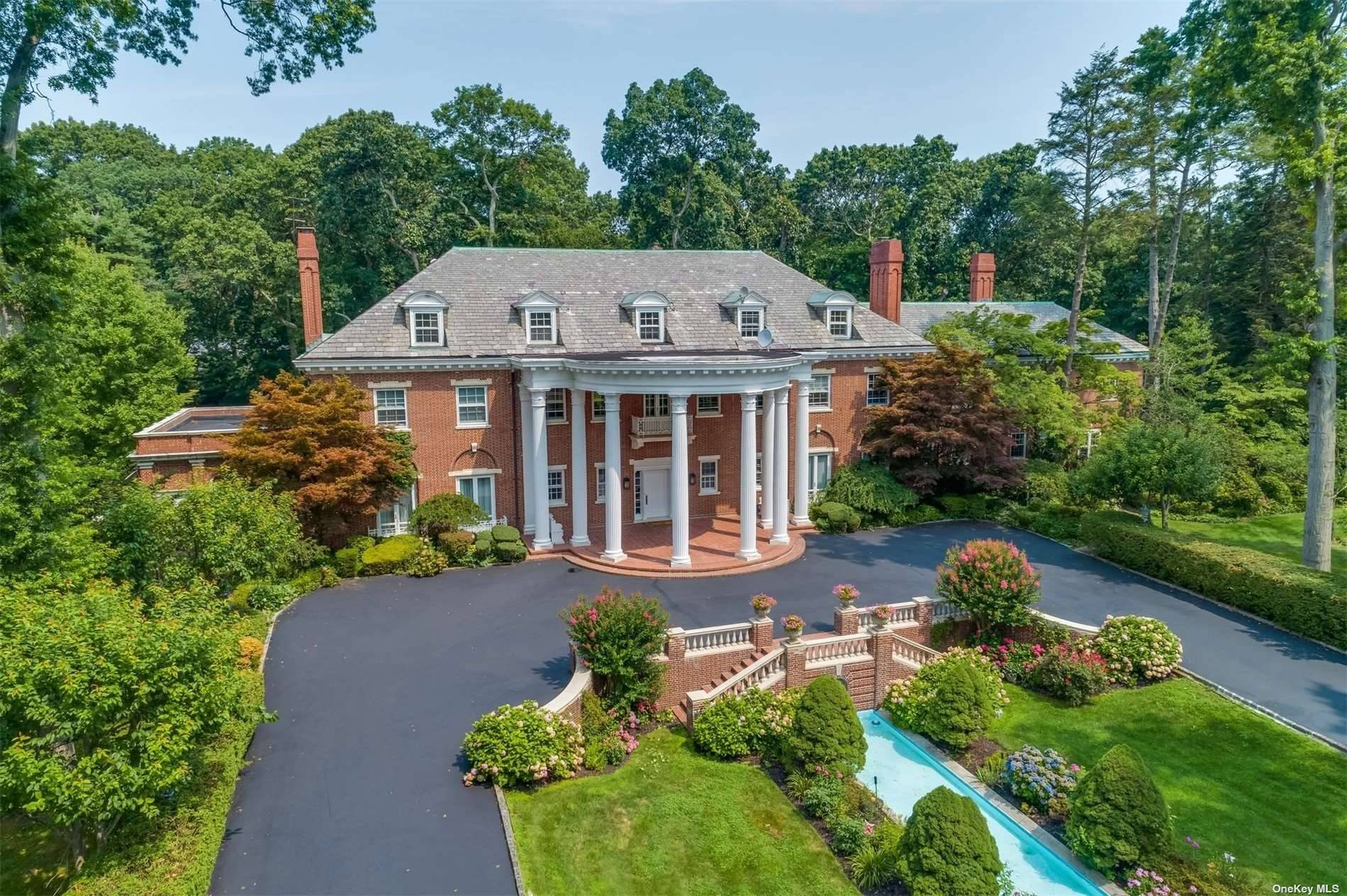 This remarkable brick Georgian revival Mansion by architect Henry Otis Chapman.