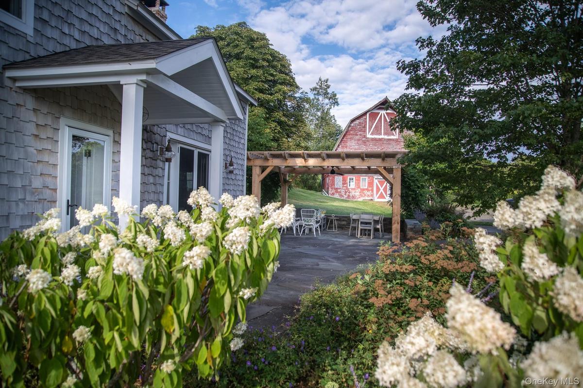 View from house to outdoor patio/pergola