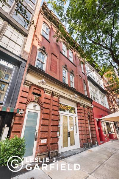 William Vogt's stable at 109 West 17th Street is a 25' wide, three story Italianate carriage house constructed almost entirely of red brick and boasts especially attractive architectural details.