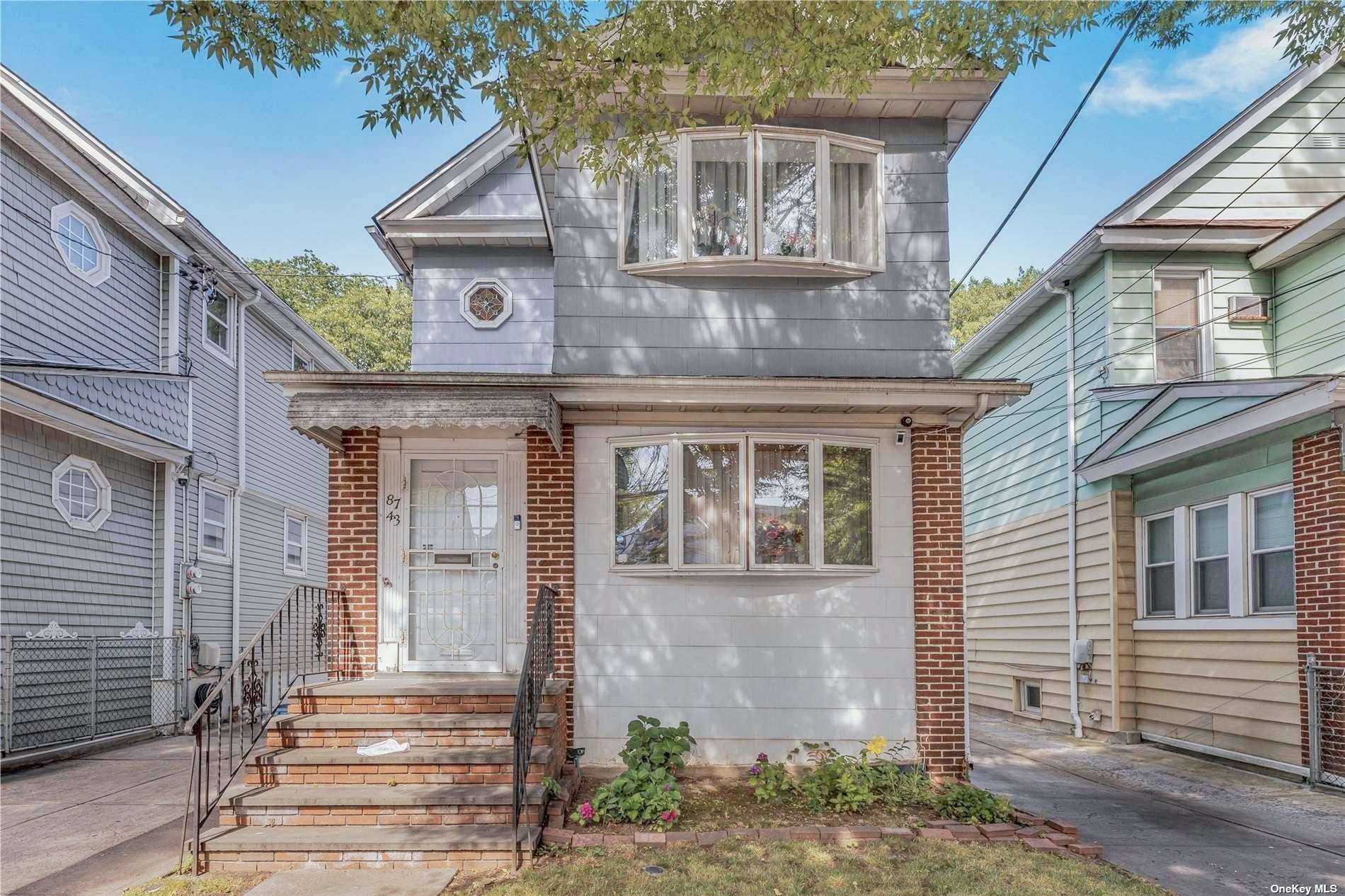 Woodhaven Legal 2 Family Property featuring 6 bedrooms, 3 full bathrooms, a formal dining room, a formal living room, an eat in kitchen, and a fully finished basement with a ...