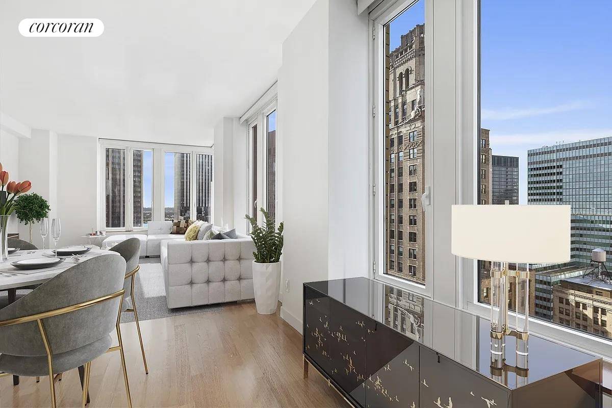 This modern 2 bedroom, 2 bathroom residence with south eastern exposure fills the apartment with natural sunlight !