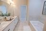 Dual sinks, soaking tub and separate shower- designed for comfort.