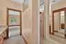 Mirrored closet door and walk-in shower