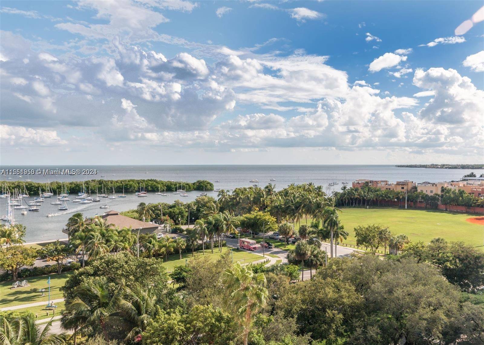 Experience breathtaking water views and the luxurious lifestyle you deserve with this magnificent 2 bedroom, 2 bath fully furnished turnkey condo in the heart of Coconut Grove.