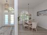 The double glass entry doors are stunning and allow so much light with extra privacy