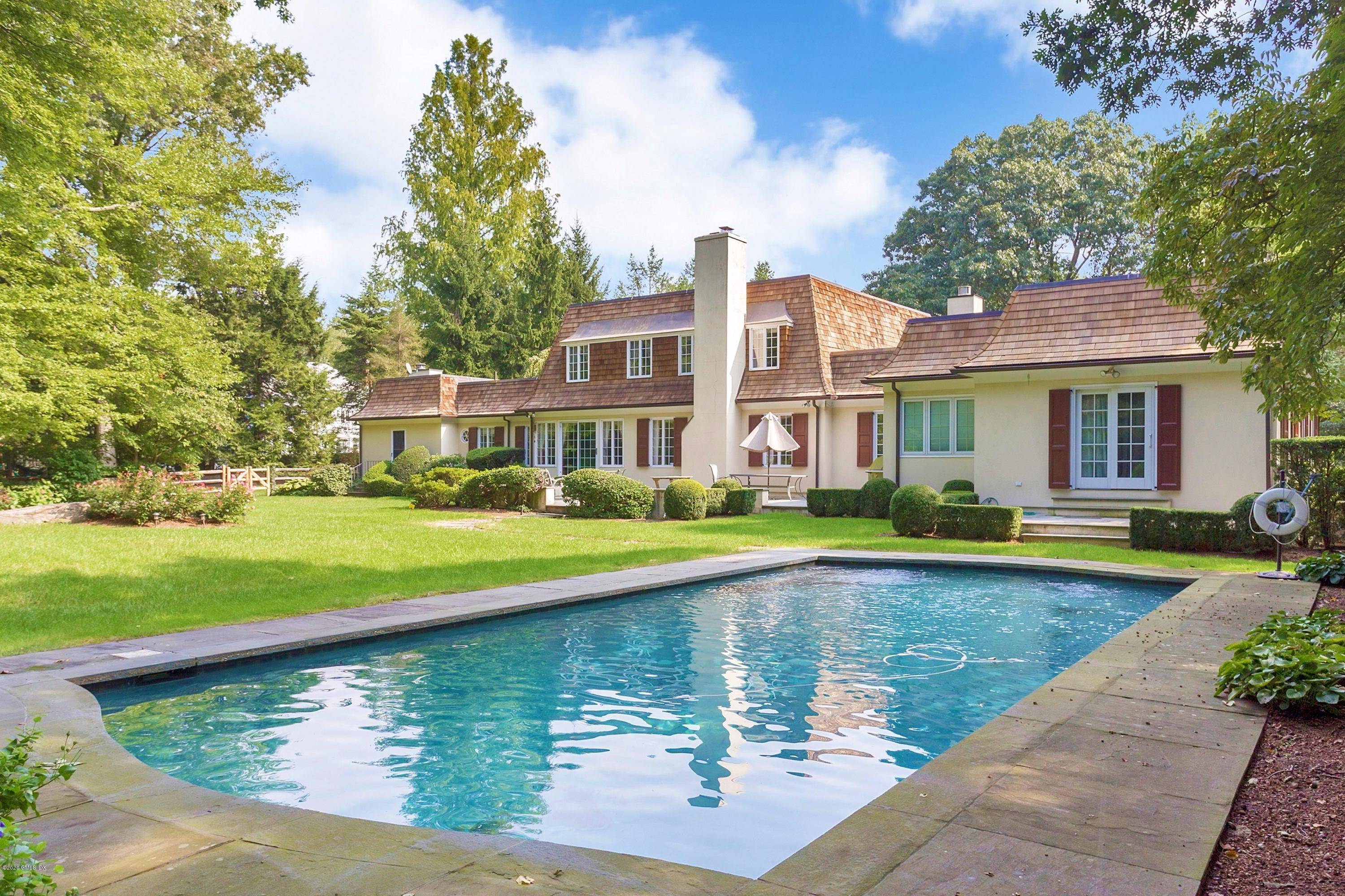 This unique mid country, European style home is situated on a cul de sac for privacy yet close to the best of Greenwich shops restaurants.