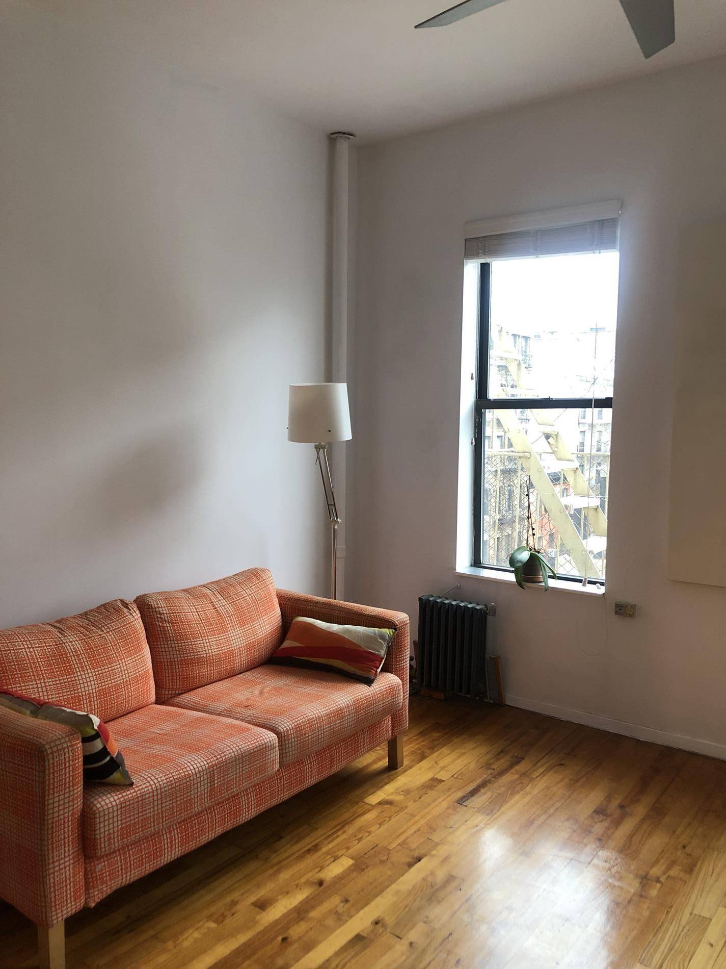 A fantastic studio, with high ceilings, charming exposed brick walls, and nice light in a well kept boutique co op building in the heart of Greenwich Village.