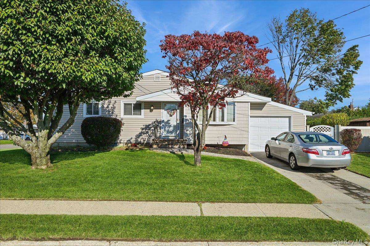 Nicely maintained expanded ranch on a 75 x 100 lot with an open floor plan.