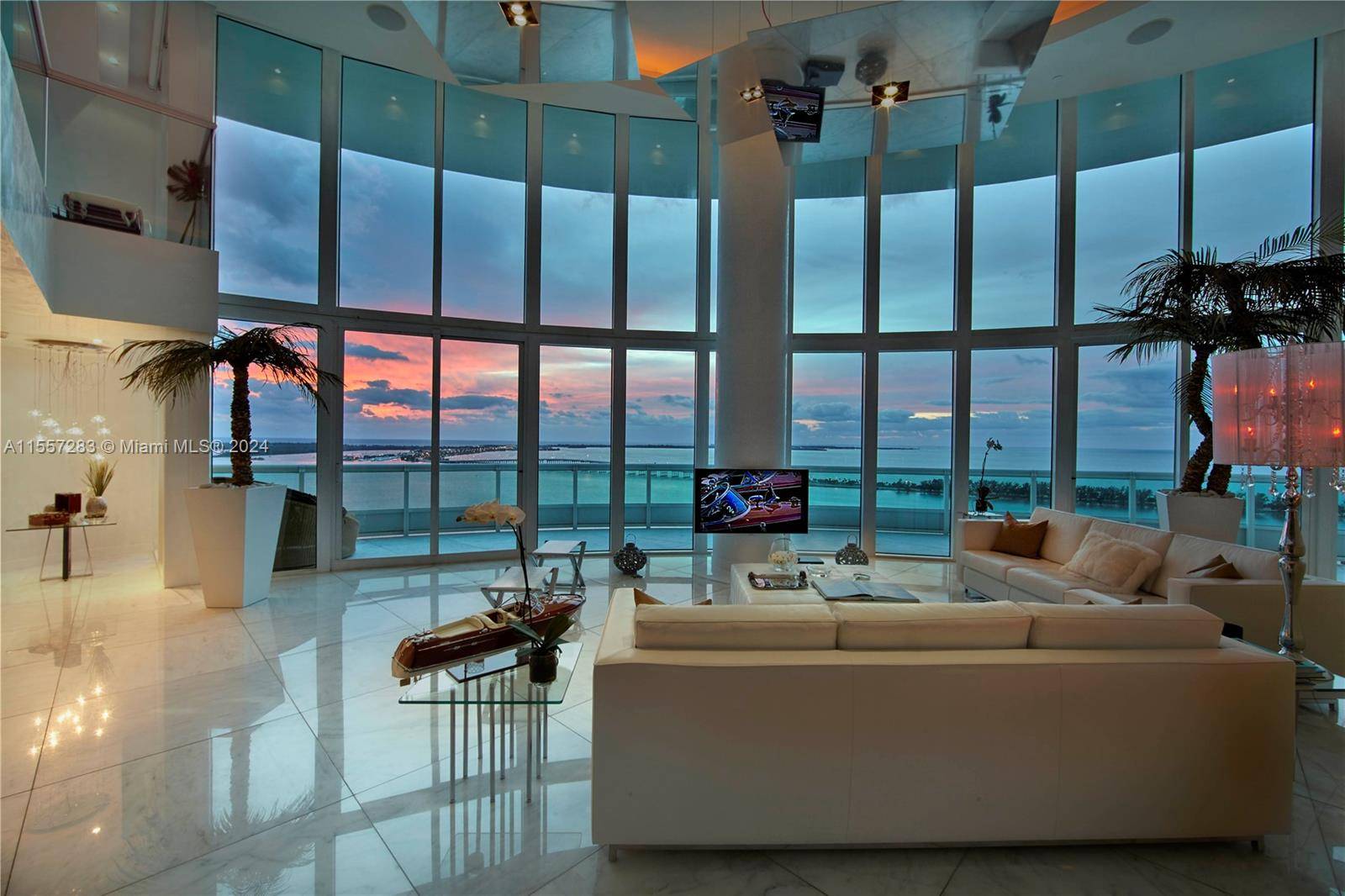 Modern and elegant 2 story unit with double height ceiling at Santa Maria in Brickell.