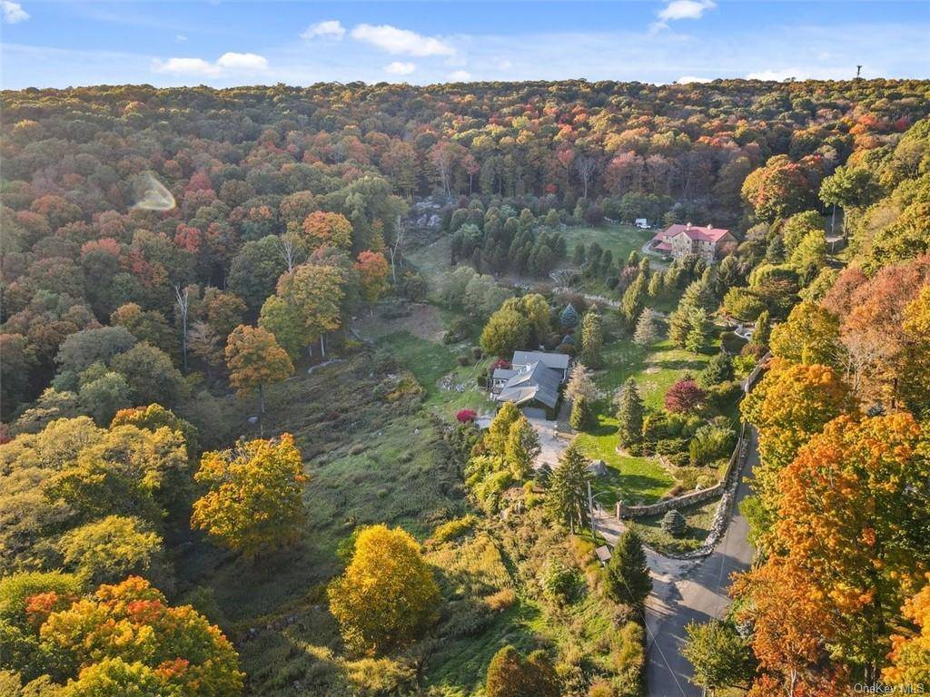 Paradise Found ! Rare opportunity to enjoy your own private country retreat just over the Westchester border.