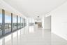 The wall of floor to ceiling windows maximize the view.