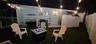 side yard with full outdoor shower and fire pit