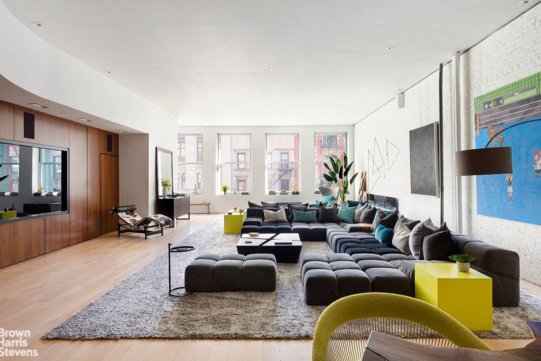 Redesigned and reimagined, this expansive 3 bedroom, 3 and a half bath loft is a downtown oasis in the heart of SoHo.