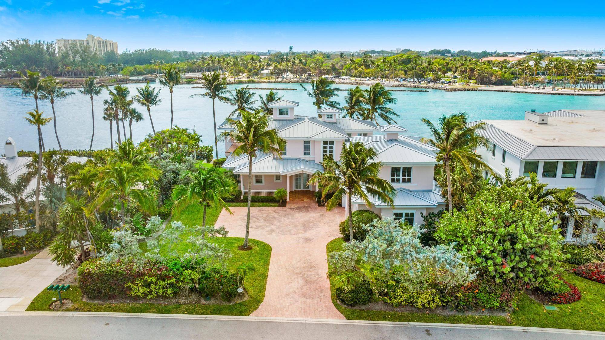 Spectacular WATERFRONT LOCATION AND VIEWS overlooking the Jupiter INLET at Jupiter Inlet Beach Colony on the south end of Jupiter Island.