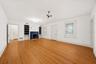 Parlor Room leading to hallway with 4 bedrooms