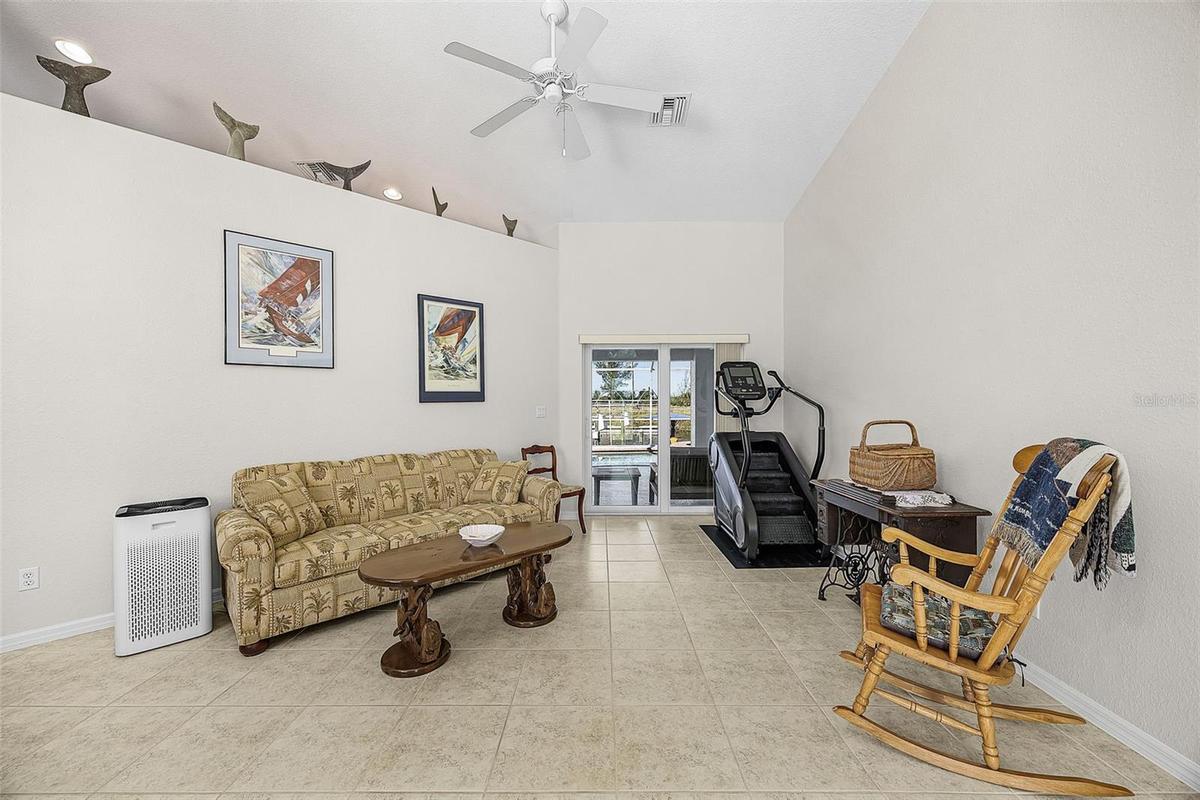Formal livingroom with sliders to lanai