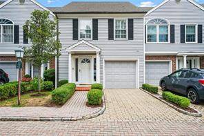 Enjoy this meticulously maintained townhome minutes to downtown Darien !