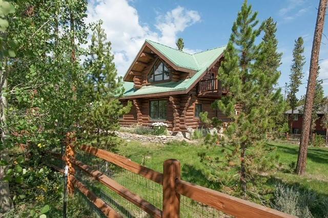 From the cozy allure of snow dusted mountain peaks to the vibrant hues of fall colored aspens, this Breckenridge cabin melds the raw beauty of the outdoors with the comforts ...