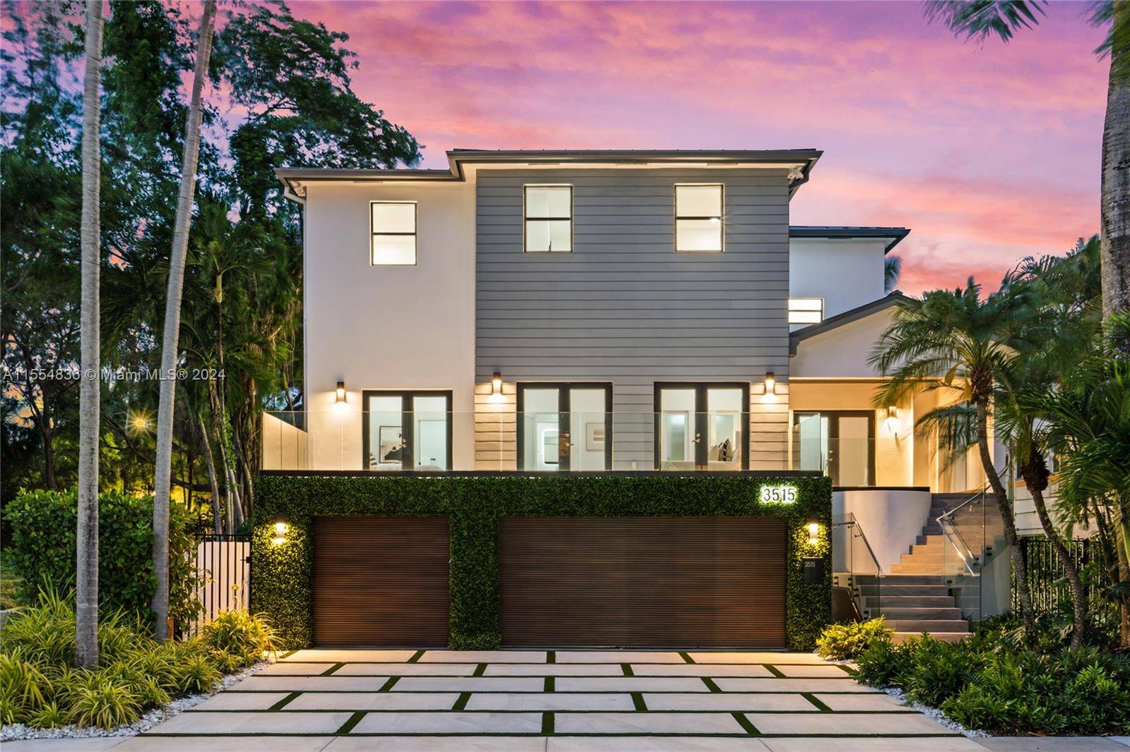 Stunning traditional modern 6 bed 7 bath 3 story home in highly desirable Northeast Coconut Grove.